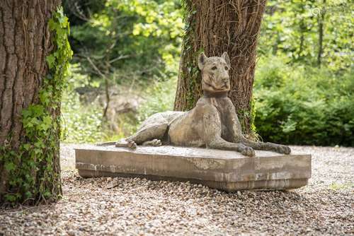 A LARGE COMPOSITION STONE FIGURE OF A RECUMBENT HOUND, 20TH ...