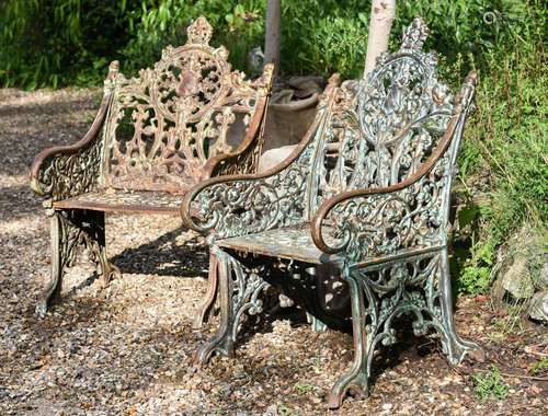 A PAIR OF CAST IRON CHAIRS, IN THE COALBROOKDALE 'GOTHIC' PA...