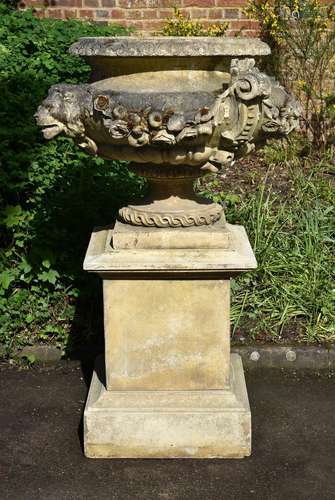 A LARGE STONE COMPOSITION TWIN HANDLED URN ON STAND, POSSIBL...