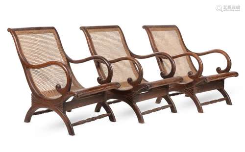 A SET OF SIX HARDWOOD AND CANED GARDEN SEATS, LATE 20TH CENT...