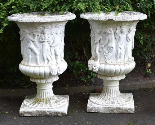 A PAIR OF CAST STONE URNS IN THE FORM OF THE MEDICI VASE, 20...