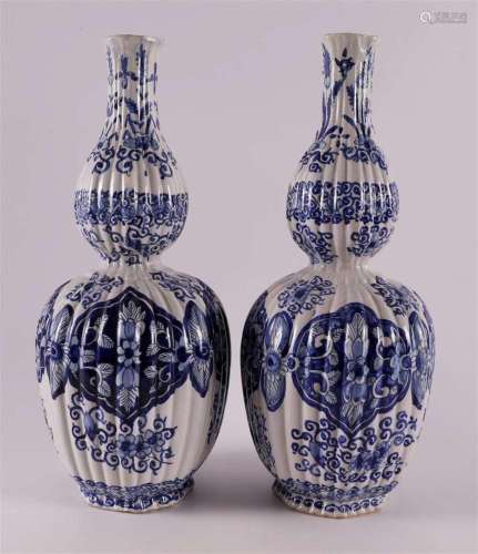 A pair of ribbed blue/white Delft earthenware gourd vases, D...