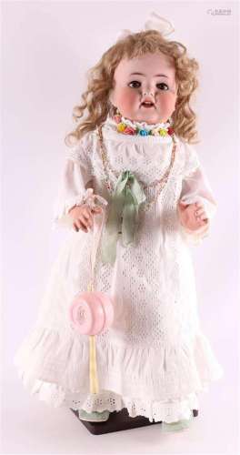 An articulated doll with porcelain head, Germany, Heubach Kö...