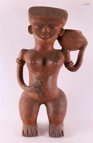 A ceramic statue in pre-Columbian style after an ancient exa...