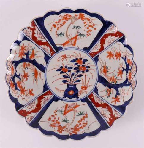 A contoured porcelain Imari dish, Japan, Meiji, circa 1900.