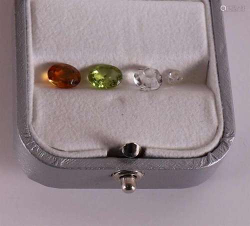 A loose citrine and peridot. Herewith marcasite and brillian...