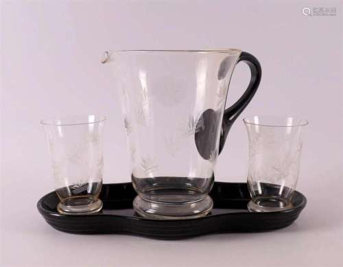 A clear glass water set with cut floral decor, ca. 1930.