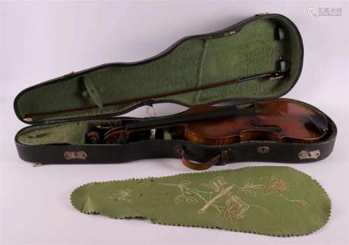 A violin in original case, early 20th century.
