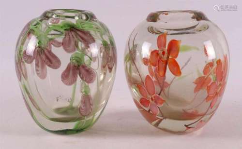 Two various thick-walled clear glass vases with polychrome f...