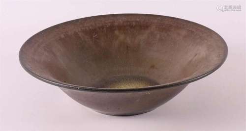 A brown glazed stoneware bowl, design and execution: Derk Ho...
