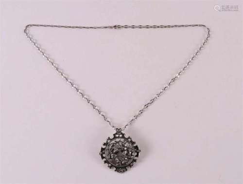 A 2nd grade 835/1000 silver necklace and pendant, floral dec...