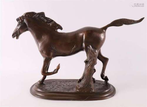 A brown patinated bronze sculpture of a horse, late 20th cen...