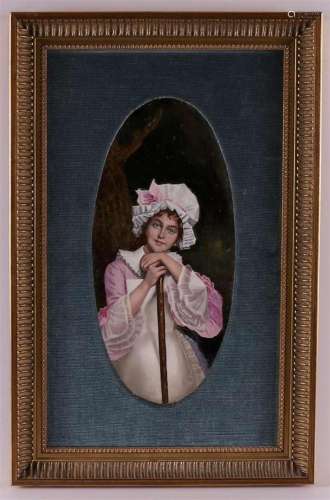 A polychrome painted oval porcelain plaque in frame, 19th C.