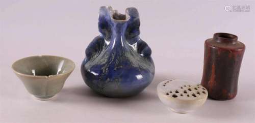 A blue flow glaze earthenware vase, design Ellen van Bendego...