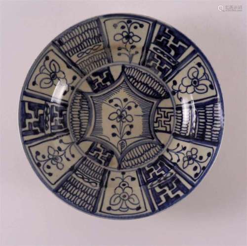 A blue and white porcelain dish after Ming example, China 19...