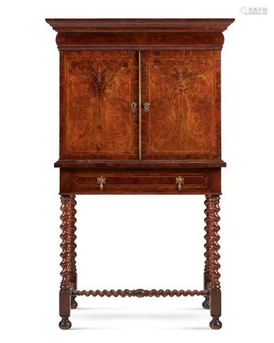 A FIGURED WALNUT AND INLAID CABINET, CIRCA 1680 AND LATER