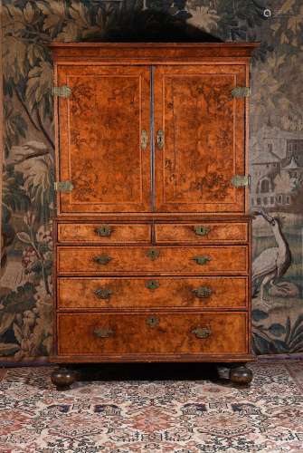A WILLIAM & MARY BURR WALNUT AND MARQUETRY CABINET ON CH...