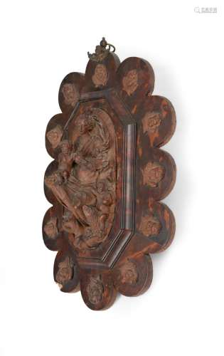 Y AN OVAL CARVED WOOD RELIEF OF THE VIRGIN AND CHILD WITH ST...