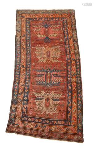 A CAUCASIAN RUG, PROBABLY ARMENIAN, approximately 290 x 136c...