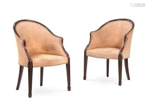 A PAIR OF GEORGE III MAHOGANY AND UPHOLSTERED LIBRARY ARMCHA...