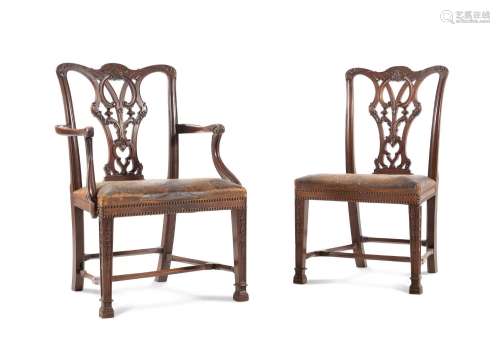 A SET OF TWELVE MAHOGANY DINING CHAIRS, IN GEORGE III STYLE,...