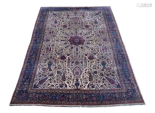 AN ISFAHAN CARPET, approximately 559 x 359cm