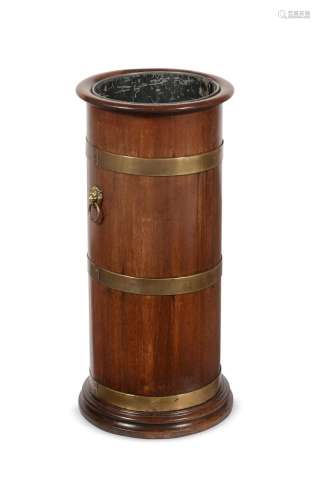 A MAHOGANY AND BRASS BOUND STICK STAND, IN REGENCY STYLE, LA...
