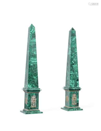 A PAIR OF MALACHITE AND GILT METAL MOUNTED OBELISKS, IN EARL...