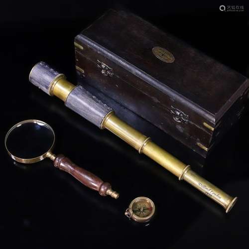 A SET OF LEATHER TELESCOPE, MAGNIFIER AND COMPASS