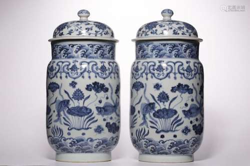 PAIR OF BLUE AND WHITE FISH & ALGAE LIDDED VASES