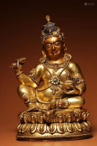 GILT BRONZE STONE-INLAID STATUE OF YELLOW JAMBALA