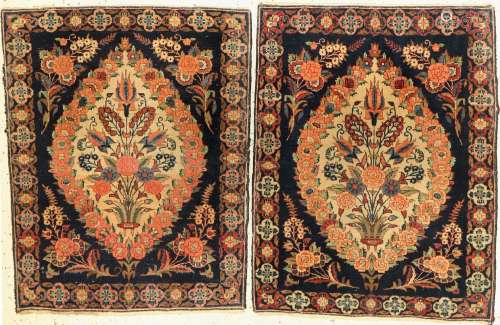 A pair of antique Kashan