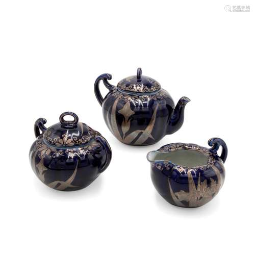 Art Nouveau porcelain and silver tea set