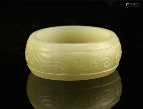 China, jade bangle, wide band of cream colored jade, with in...