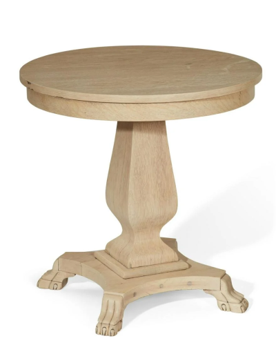 A Neoclassical style bleached oak circular table