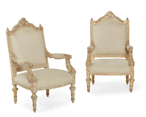 A pair of Neoclassical style painted armchairs