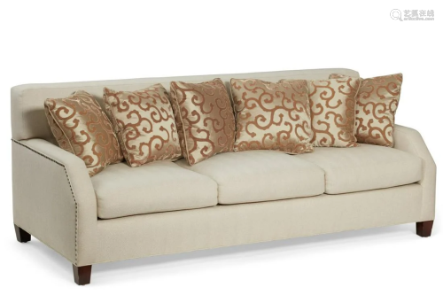 A contemporary fully upholstered sofa