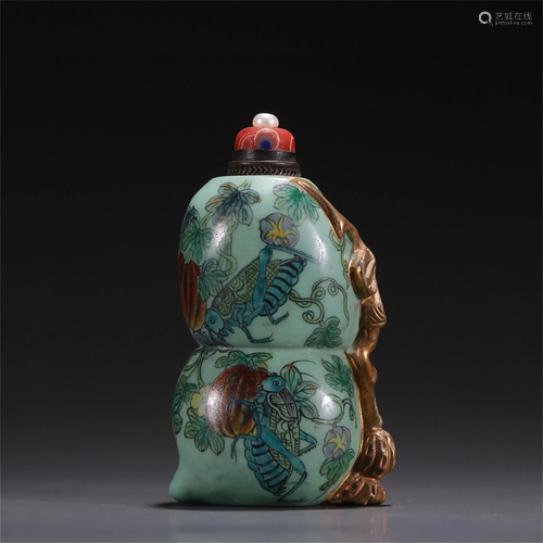 A Chinese Carved Peking Glass Snuff Bottle