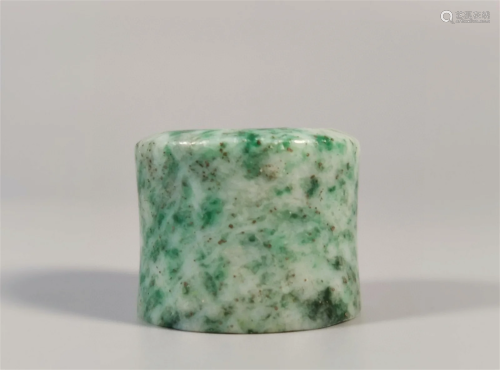 A Chinese Carved Jadeite Ring