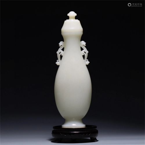 A Chinese Carved Jade Vase with Lid