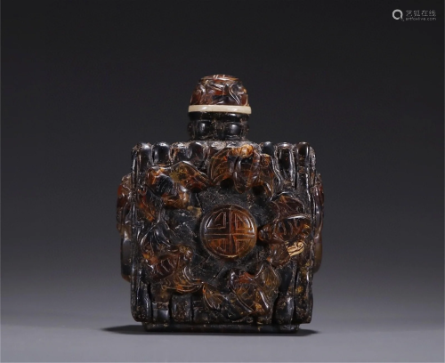 A Chinese Carved Amber Snuff Bottle