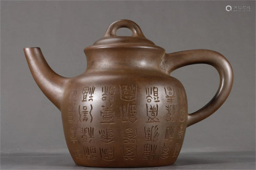 A Chinese Carved Clay Tea Pot with Lid
