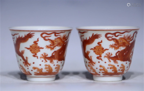 Pair of Chinese Iron-Red Glazed Porcelain Cups of Dragons De...