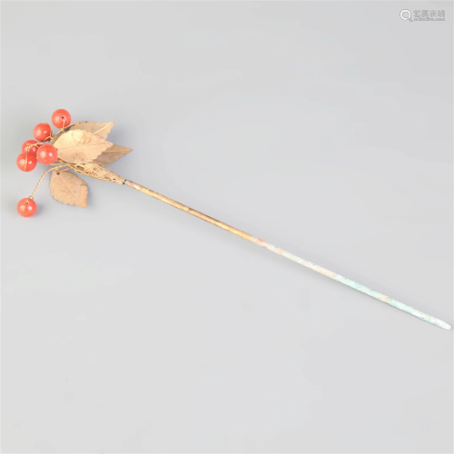 A FINE GEMSTONE HAIRPIN