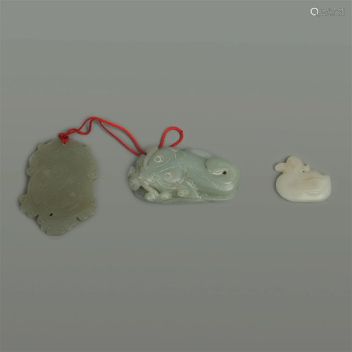 GROUP OF FOUR JADE PENDANT