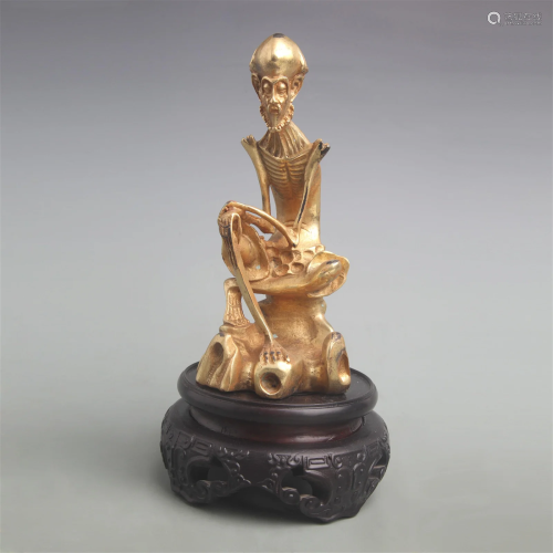 A FINE GILT BRONZE ROHAN STATUE