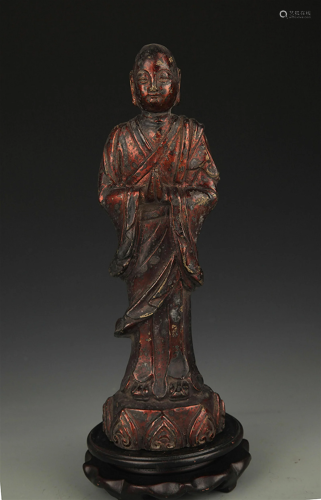 A FINELY CARVED BRONZE IN ROHAN FIGURE