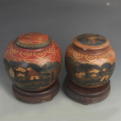 PAIR OF GILT LACQUER STORY PATTERN WOODEN TEA JAR