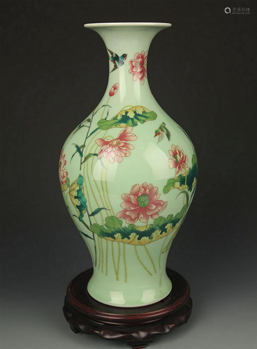 A GREEN GLAZED FAMILLE ROSE LOTUS FLOWER VASE