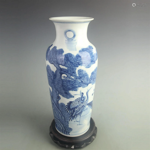 BLUE AND WHITE PINE TREE FIGURE VASE